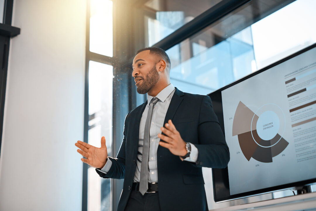 Businessman explaining feedback updating team employee presentation skills training development