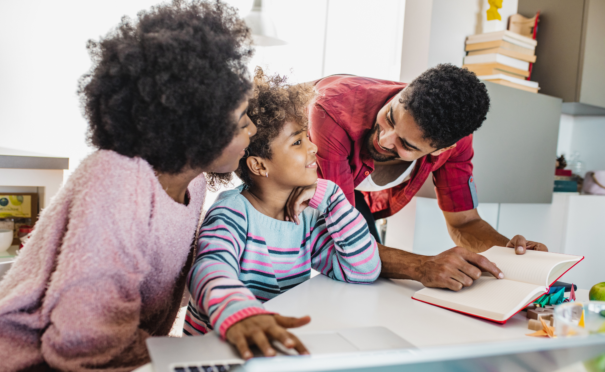 parents helping daughter child education