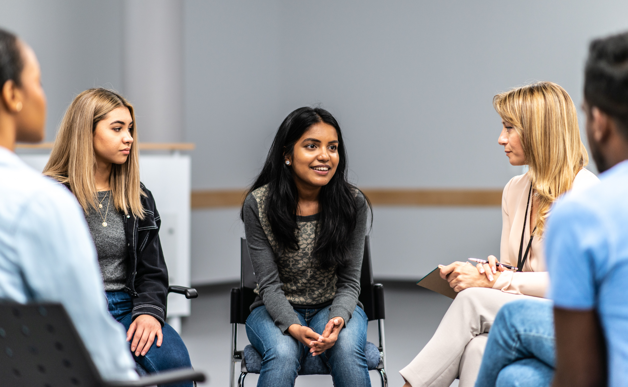 young teens talking counseling group therapy mental health