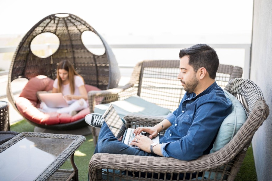 remote working happy work environment happy team members hybrid work
