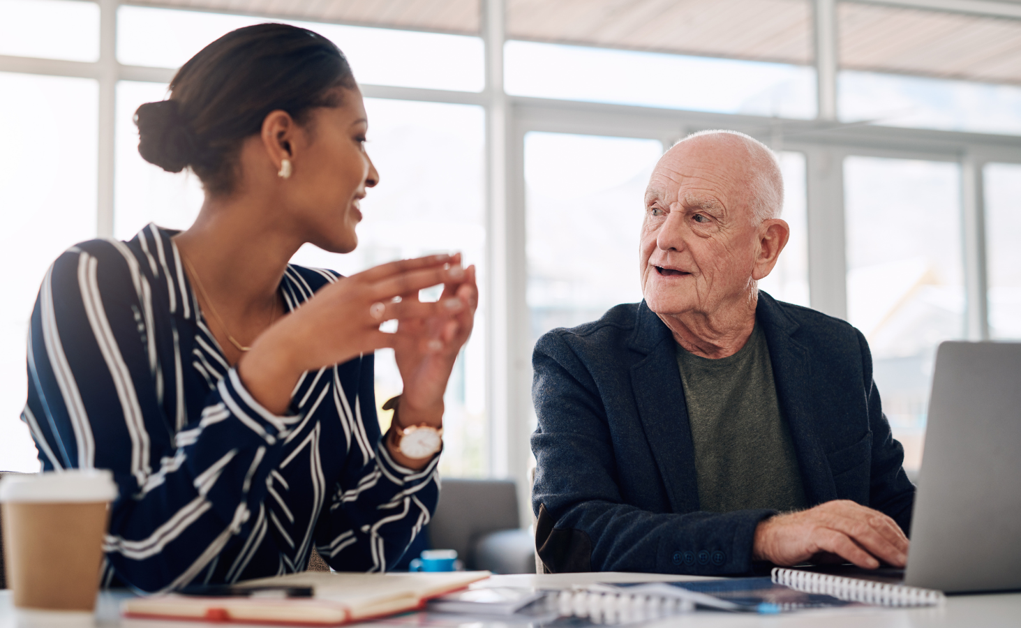 different generations working in the office together baby boomer and millennial and gen x gen z working together in harmony accepting each other