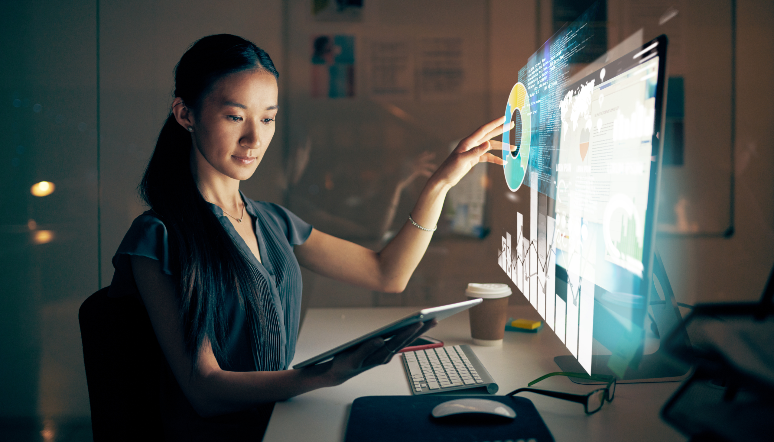 young female employee working with a digital interface with her hands dealing with data and hr technology