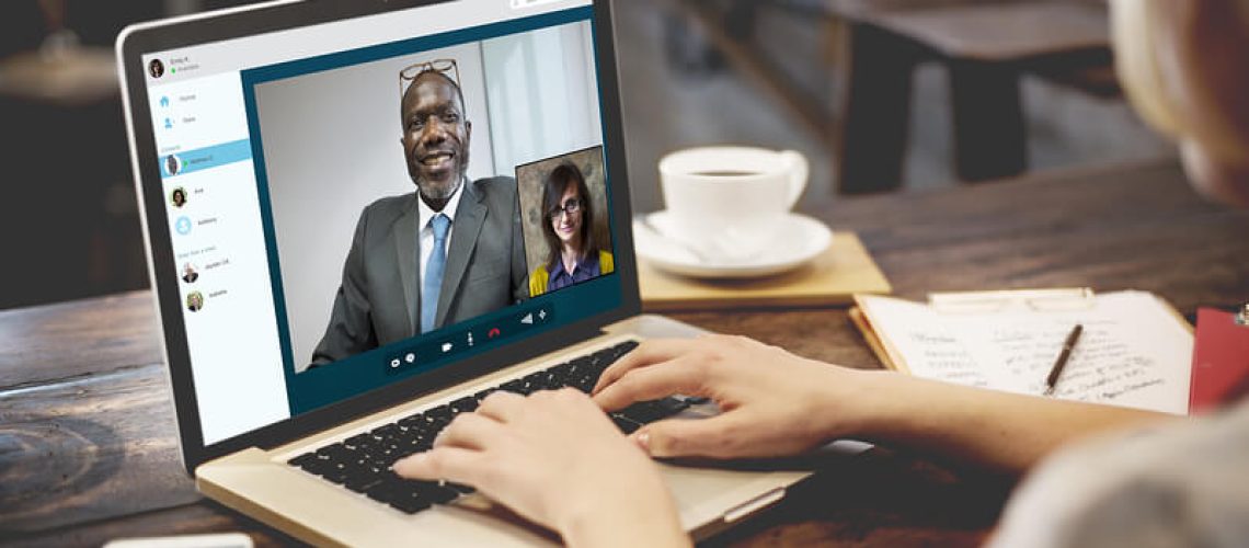 3 Key Attributes of Successful Remote Leaders remote workers laptop virtual meeting workplace