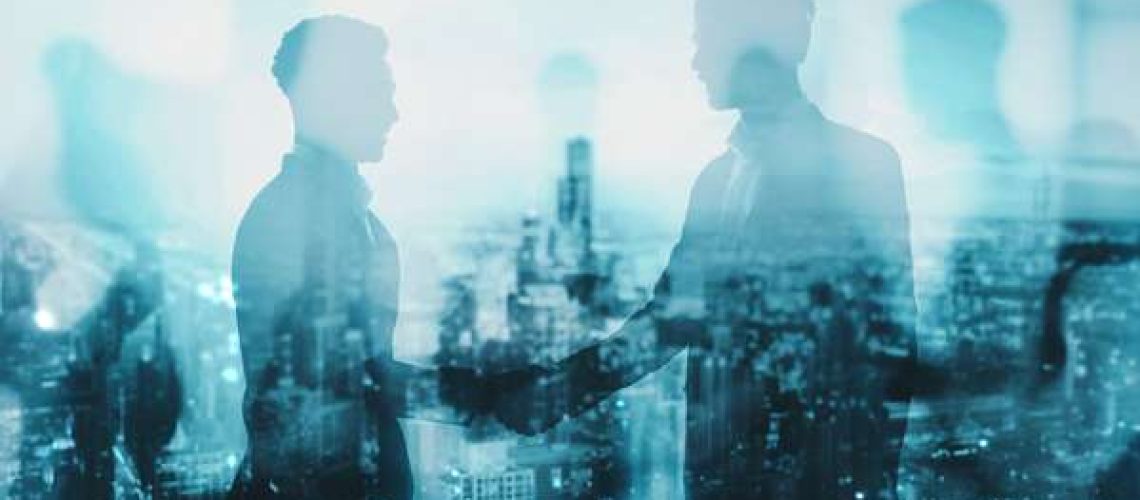 Businessmen and city view