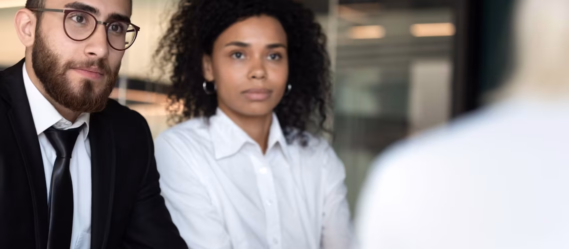 Diverse hr managers listening to job applicant during interview