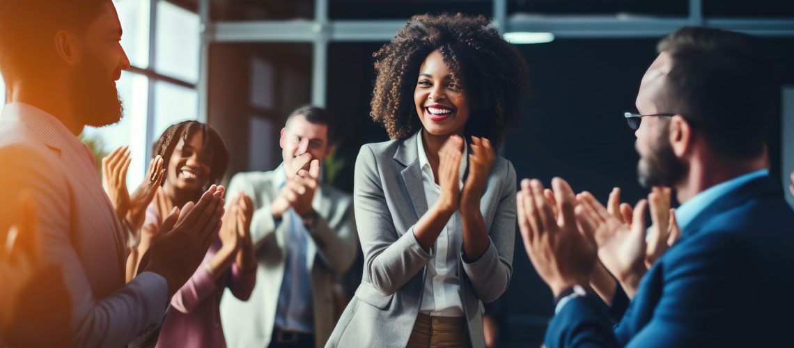 Employees Applauding to celebrate the success of what they have accomplished using Generative AI to help manage their talent happy work environment reward recognition culture positive clapping congratulate employees career hr departments reward recognition
