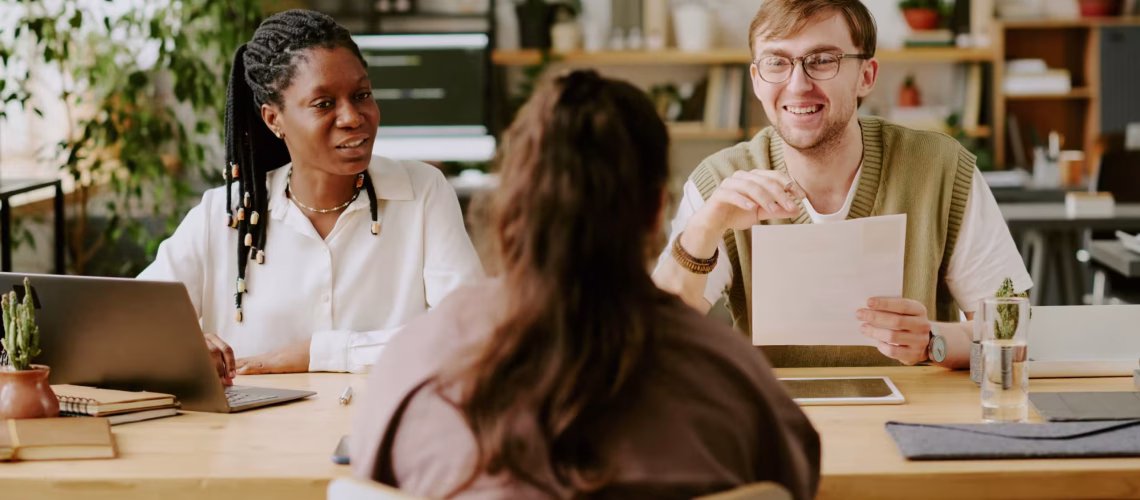 skills based hiring and recruitment interviews where managers are looking at a job candidate's resume and CV