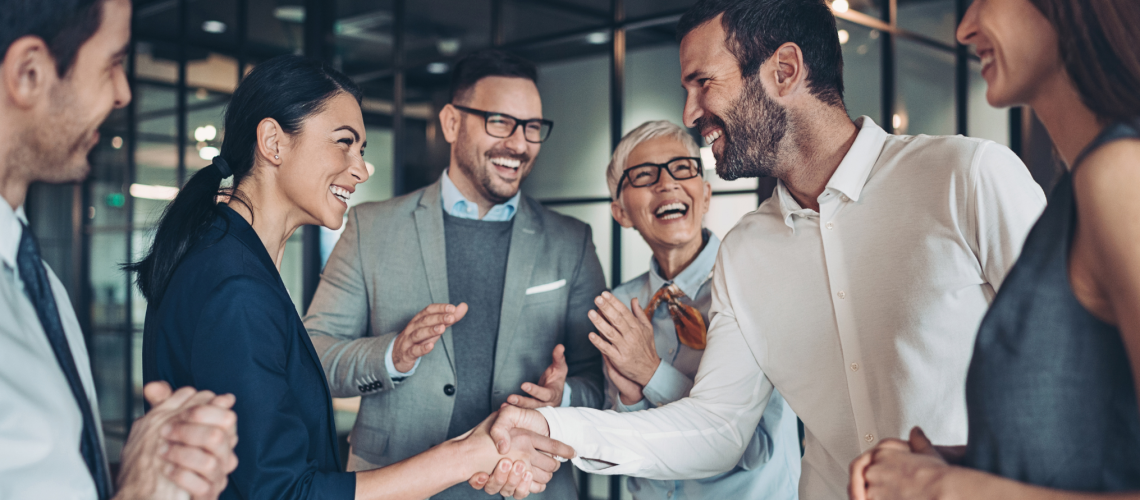 team happy shaking hands celebrate strategy leadership leaders engaging with employees value leader lead leadership employer brand